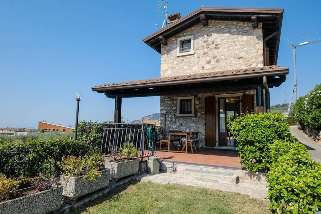 Вилла Casa Delle Ochette Костермано Экстерьер фото